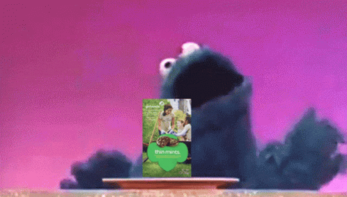 Cookie Monster Holding A Box Of Thin Mints GIF