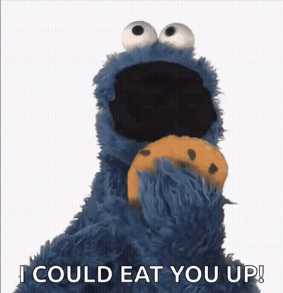 Cookie Monster Holding Cookie Saying I Could Eat You Up GIF