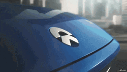 Cool Blue Electric Car Driving Around GIF