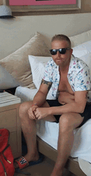 Cool Guy Sitting In Bed GIF