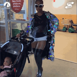 Cool Mom Wearing Shades And Heeled Boots GIF