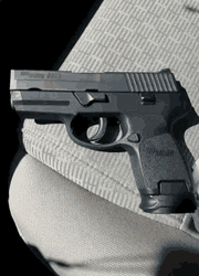 Cool Pistol Gun On A Car Seat GIF