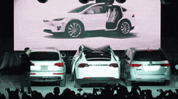 Cool White Tesla Car On Display GIF