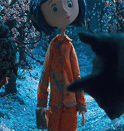 Coraline Standing Next To Black Cat In Snow GIF