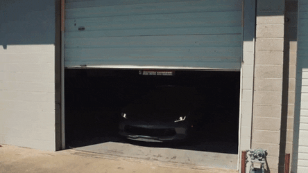 Corvette Fast Car Coming Out Of The Garage GIF