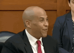 Cory Booker Watch Me Shoulder Brush GIF