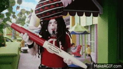 Costumed Person Holding Red White Pen With Letter A GIF