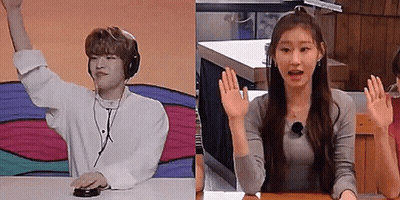 Couple At Table, Hands Up, Man With Headphones GIF