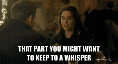 Couple At Table Whispering That Part GIF