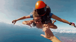 Couple Hand Heart Gesture Sky Diving GIF