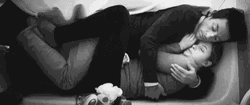 Couple Hold In The Sofa GIF
