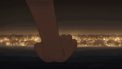 Couple Holding Hands Gazing In Dark Room GIF