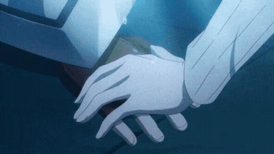 Couple Holding Hands In Dark Room With Blue Background GIF