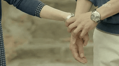 Couple Holding Hands Woman Wearing Watch GIF