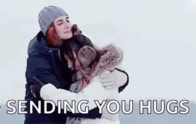 Couple Hugging In The Snow Sending You Hugs GIF
