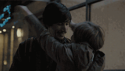 Couple Intimately Hugs And Kisses GIF