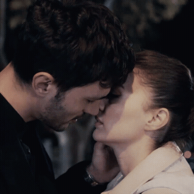 Couple Kissing Woman Touching Man's Face GIF