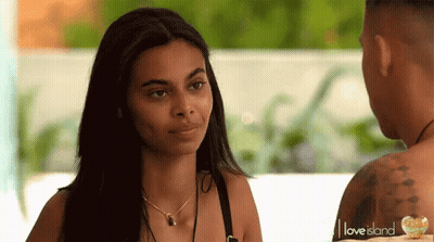 Couple Looking At Each Other Love Island Necklace GIF