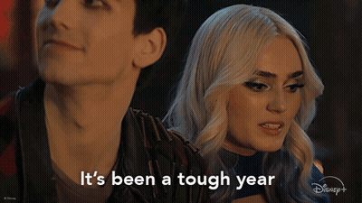 Couple Looking At Each Other Saying It's Been A Tough Year GIF