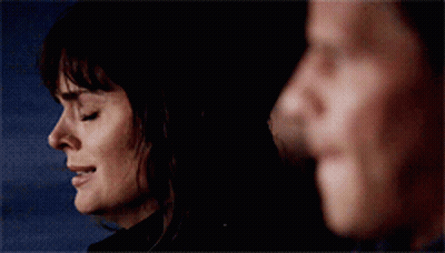 Couple Looking, Woman Crying GIF