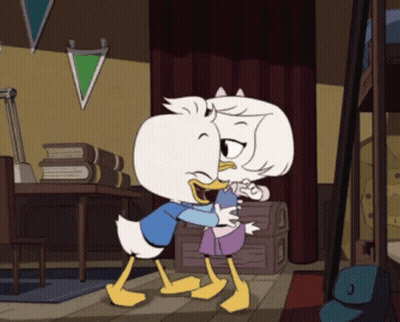Couple Of Cartoon Characters Hugging In Room GIF
