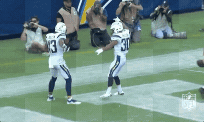 Couple Of Football Players On Field GIF