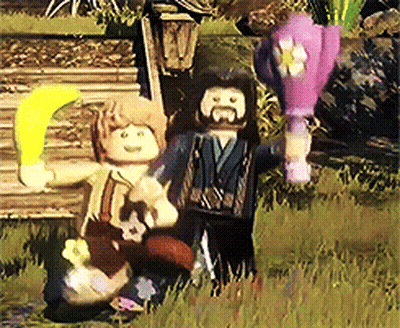 Couple Of Lego Figures Standing In Field GIF