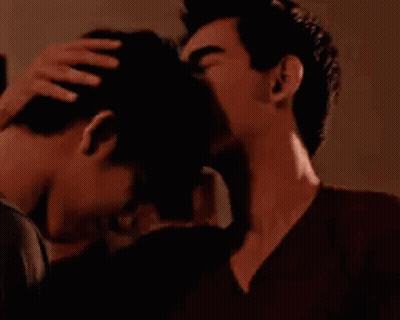Couple Of Men Kissing On Forehead GIF