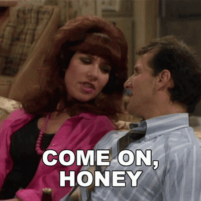 Couple On Couch Woman Says Come On Honey GIF