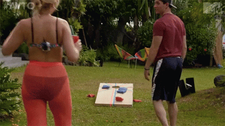 Couple Playing Cornhole GIF