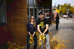 Couple Playing Fall Leaves