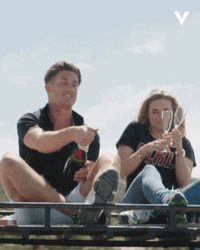 Couple Popping Champagne GIF