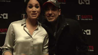 Couple Posing Suits College Tour Wall GIF