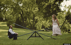 Couple Riding Seesaw Funny Wedding GIF