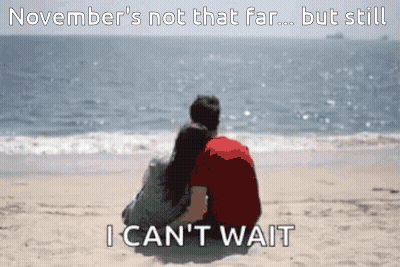 Couple Sitting On Beach Waiting GIF