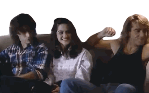 Couple Sitting On Couch Crossed Arms Sticker