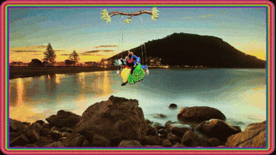 Couple Sitting On Swing Over Water GIF