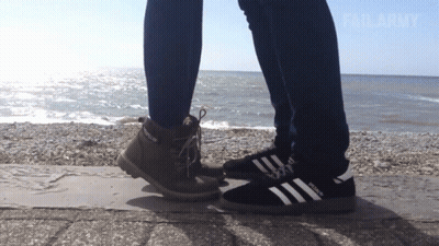 Couple Standing Next To Each Other Saying Failarmy GIF