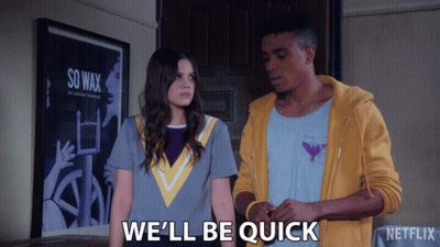 Couple Standing Next To Each Other Well Be Quick GIF