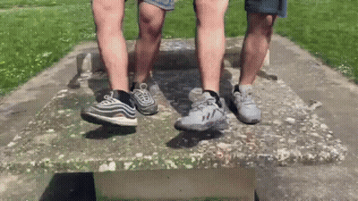 Couple Standing On Stone Table GIF