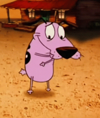Courage The Cowardly Dog Is Standing In The Dirt In Front Of A Building . GIF