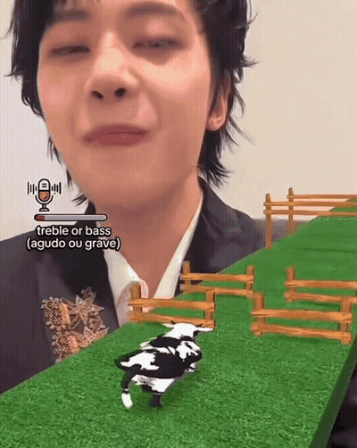 Cow With Horns On Yellow Background Saying What's That GIF