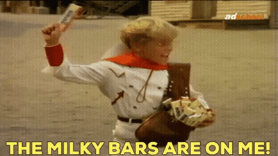 Cowboy Boy Holding Milky Bars Saying The Milky Bars Are On Me GIF