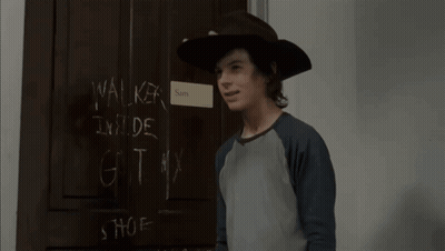 Cowboy Hat Man At Door With Walker Inside GIF