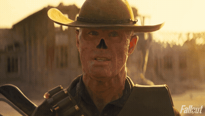 Cowboy Hat Man Holding Gun Fallout GIF