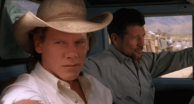 Cowboy Hat Man Next To Man In Car GIF
