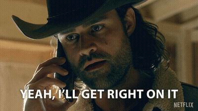 Cowboy Hat Man On Phone Saying Yeah I'll Get Right On It GIF