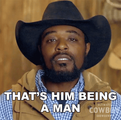 Cowboy Hat Man Saying That's Him Being A Man GIF