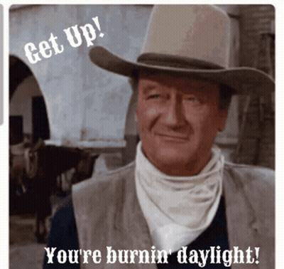 Cowboy Hat Man Says Get Up You're Burnin Daylight GIF
