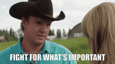Cowboy Hat Man Talking To Woman Fight For What's Important GIF